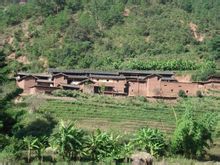 Foden af ​​landsbyen: Chuxiong City, Yunnan Chuxiong landbefolkningen over foden af ​​landsbyen